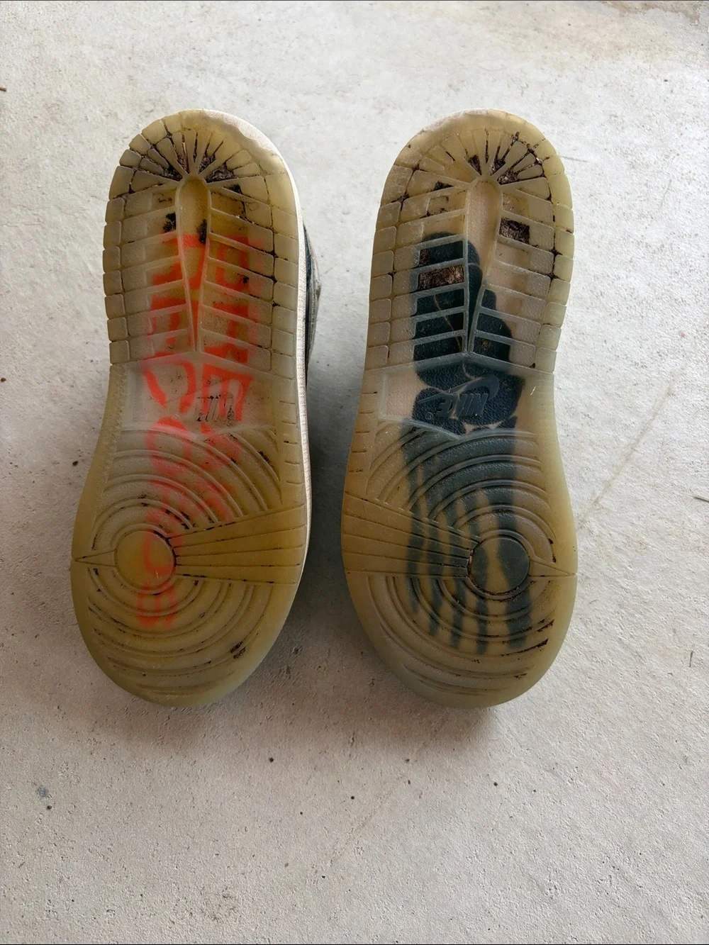 Nike Kids Black and White High-Top Sneakers with Orange Logo